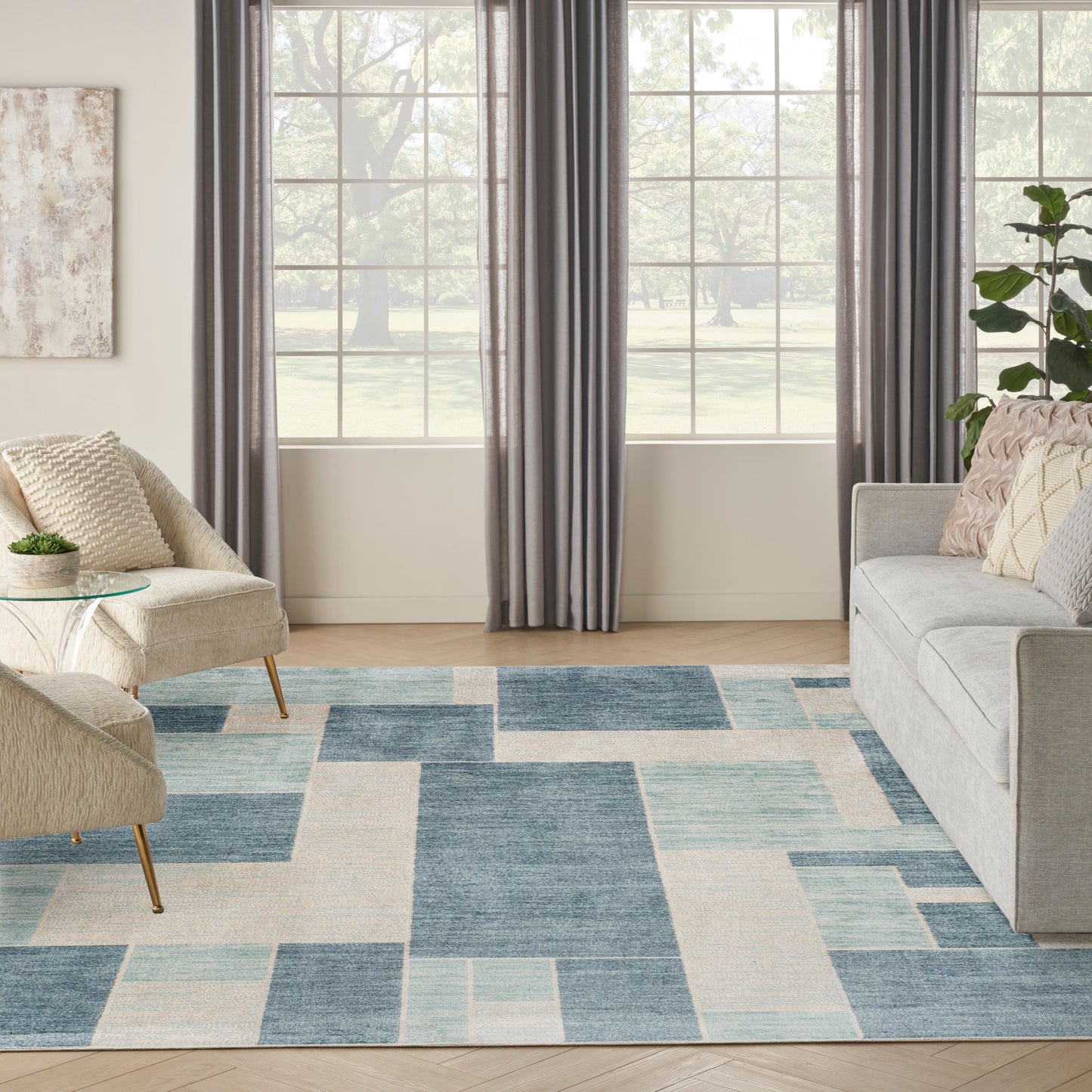 Nourison Astra Machine Washable 6'7" x 9' Blue Ivory Modern Indoor Rug