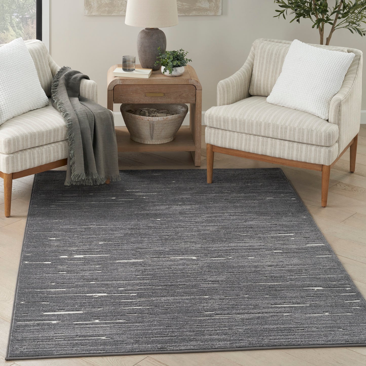 Nourison Care Free 6'7" x 9'2" Grey Modern Indoor Rug