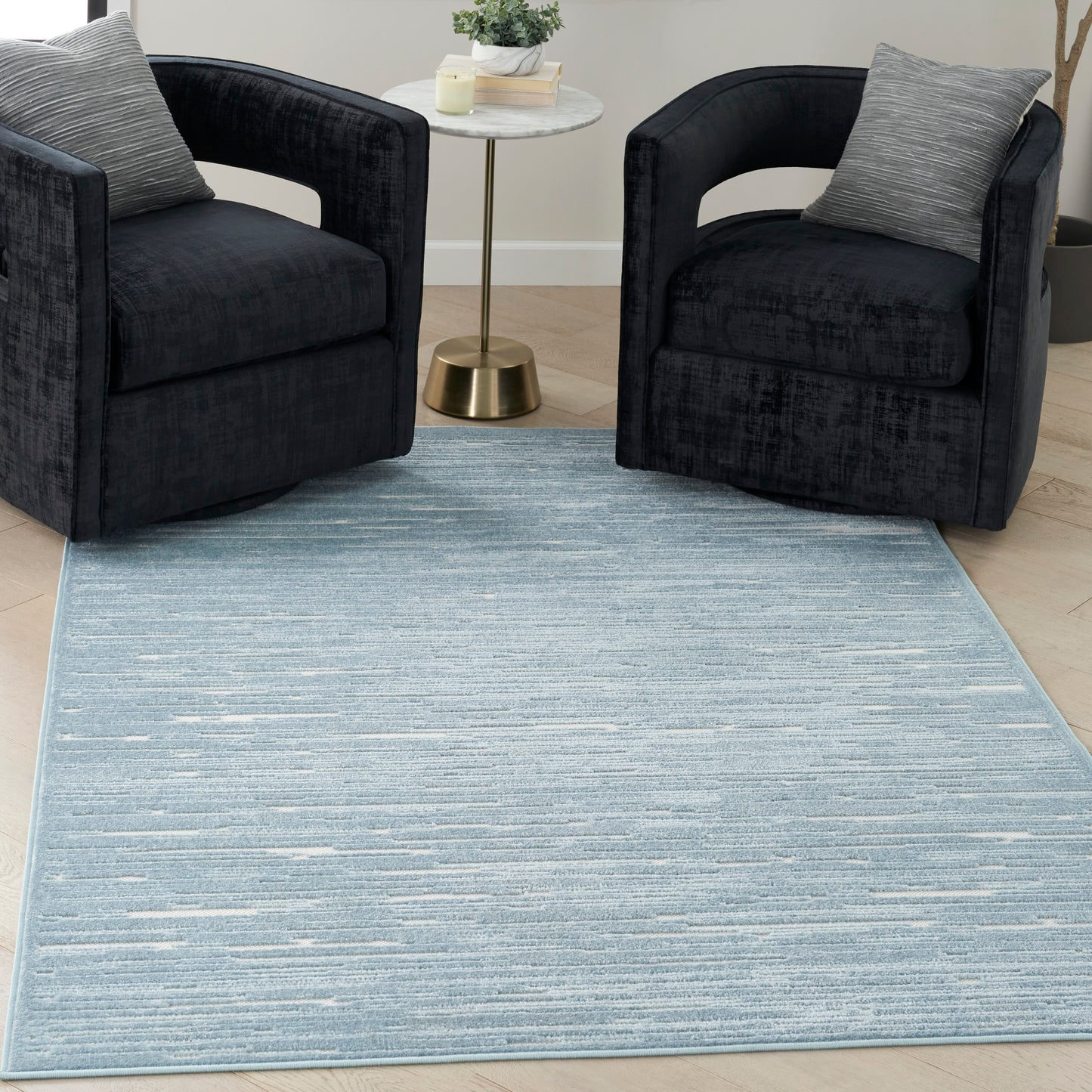 Nourison Care Free 6'7" x 9'2" Blue Modern Indoor Rug