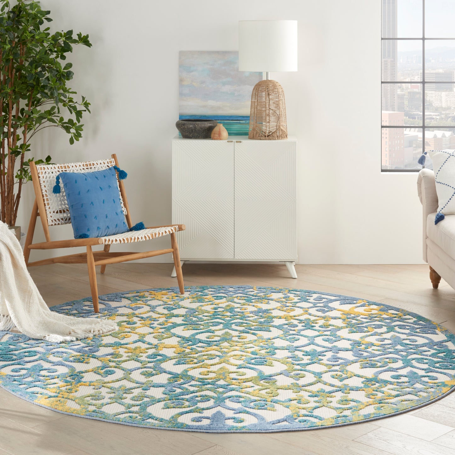 Nourison Aloha 7'10" x Round Ivory Blue Contemporary Rug