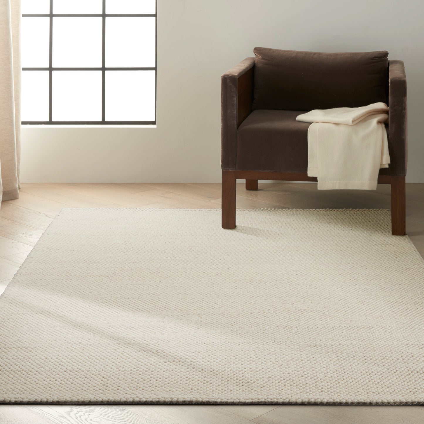 Calvin Klein Textured Dots 5'3" x 7'3" Cream Beach Indoor Rug