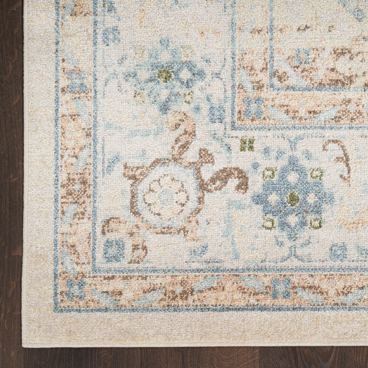 Nourison Astra Machine Washable 6'7" x 9' Ivory Blue Vintage Indoor Rug