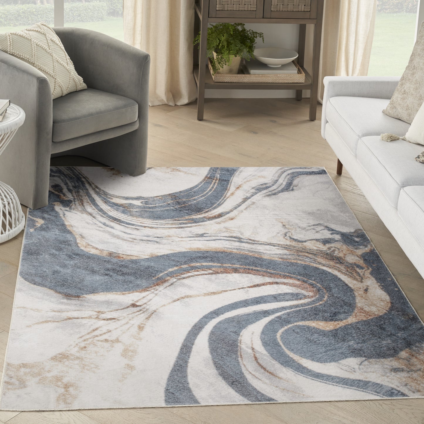 Nourison Astra Machine Washable 5'3" x 7' Ivory Blue Modern Indoor Rug