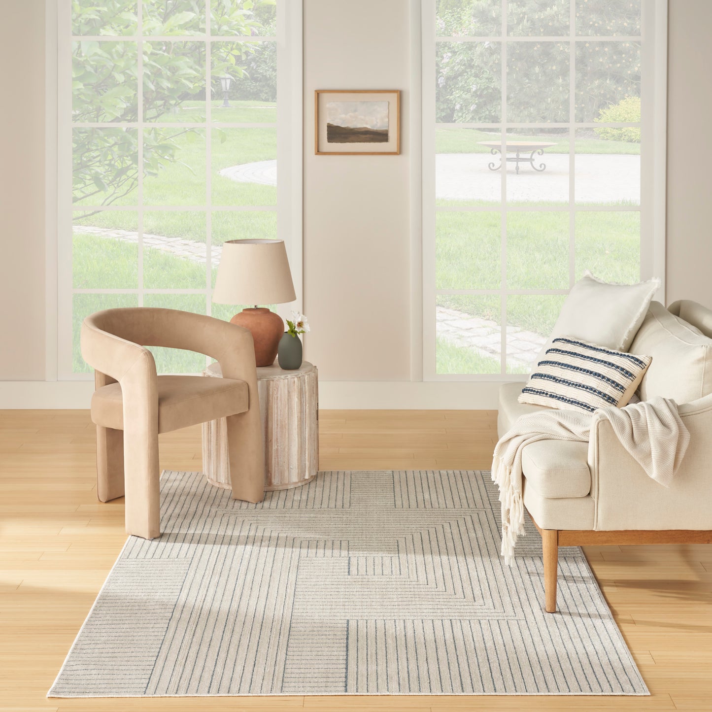 Nourison Washable Decor 6'7" x 9' Cream Blue Modern Indoor Rug