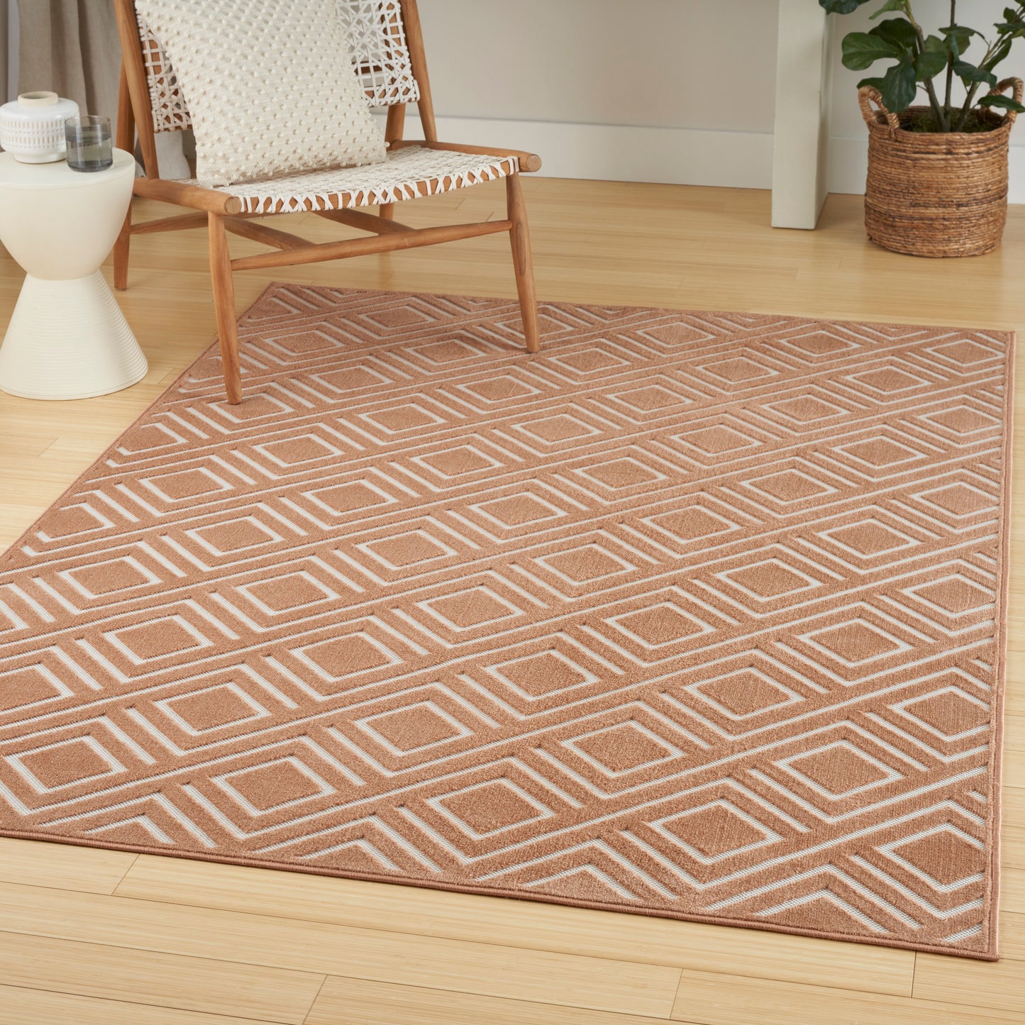 Nourison Care Free 6'7" x 9'2" Copper Modern Indoor Rug